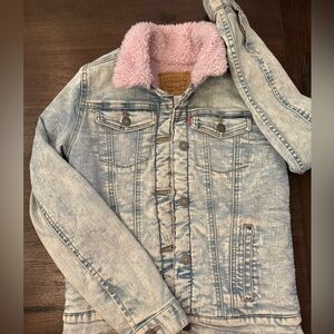 Adorable denim white washed denim lined with pink sherpa. New never worn.
